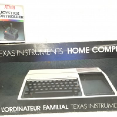 A Boxed Texas Instruments Home Computer With Software And With An Atari Joystick.(2).