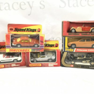 3 Boxed Matchbox Speed Kings. A Mercedes 350 5LC. A Ford Capri MK II. A Maserati Bora. And A Corgi JPS Lotus F1. A Dinky Princess 2200HL Saloon And. A Matchbox 1938 Luganda Drophead Coupe. Boxes In Various States.