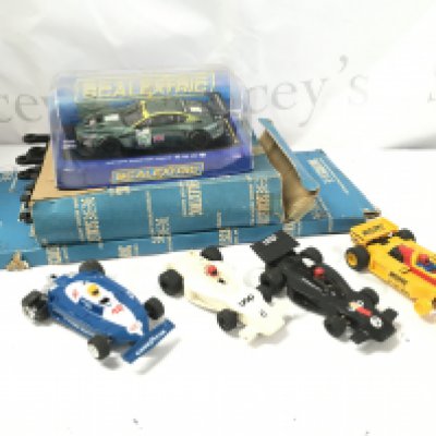 A Box Containing A Collection of Various Scalextric Parts and Spares Including A Boxed Aston Martin DBR9