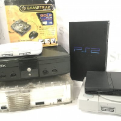 WITHDRAWN A Collection of Games Consoles with Controllers. Leads And Games.