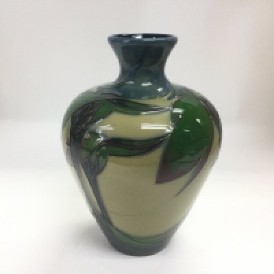 A Moorcroft Moon Valley vase, approx height 18cm. Shipping category D.