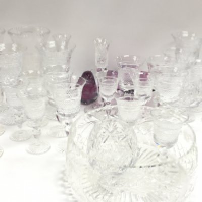 A collection of cut glassware including a Kerry art glass bowl and bird paperweight. This lot cannot be posted