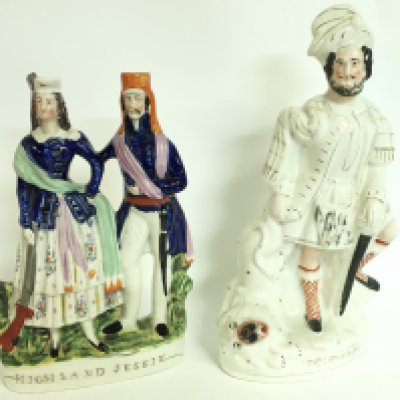 Staffordshire porcelain figures including Highland Jessie and The Lion Slayer. 35 & 43cm tall. This lot cannot be posted