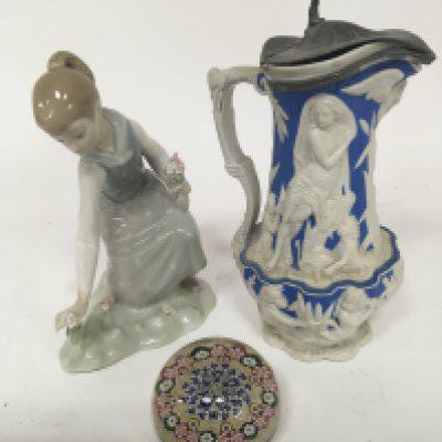 A Quality Millefiori glass paperweight a Victorian jug with raised relief decoration and a Lladro figure. (3)