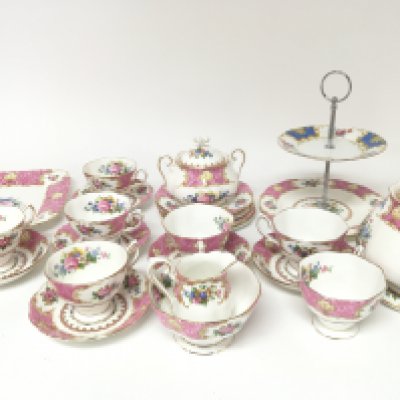 A Royal Albert Lady Carlyle pattern porcelain tea set with pink and patterns of flowers no obvious damage cake stand with a conforming dish.