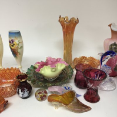A collection of Carnival glass and other glass ornaments.