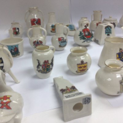 A collection of 55 items of WH Goss ware with various crest and model shapes .