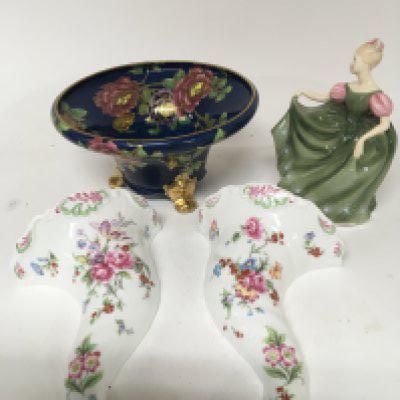 A Maling Ware powder blue bowl decorated with flowers and gilt and a pair of Worcester Porcelain wall pockets and a Royal Doulton figure. No obvious damage or restoration.