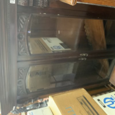 A carved and glazed bookcase. (D). NO RESERVE