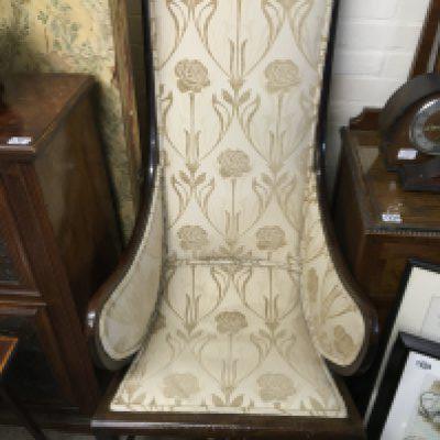 An oak wood Edwardian chair with light beige floral design upholstery. 130cm tall.- NO RESERVE