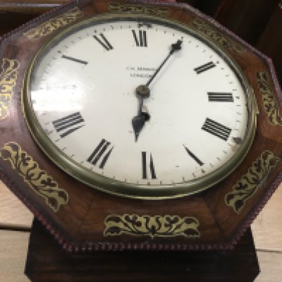 A J .W Benson of London rosewood brass inlaid wall clock the painted dial with Roman numerals. 32 x 36=.