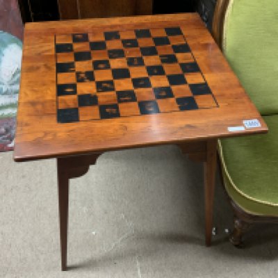 A modern teak occasional table with painted chess board top. 61cm x 61cm x 65cm