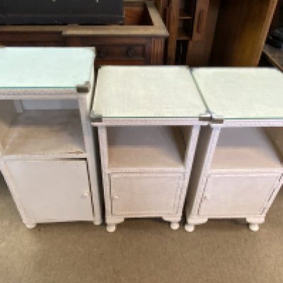 3 Lloyd Loom white painted bedside cabinets together with a Lloyd Loom bedroom chair.