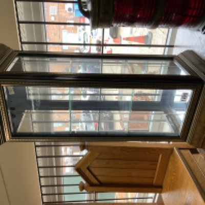 A small glass display cabinet. 81cm x 30cm x 30cm