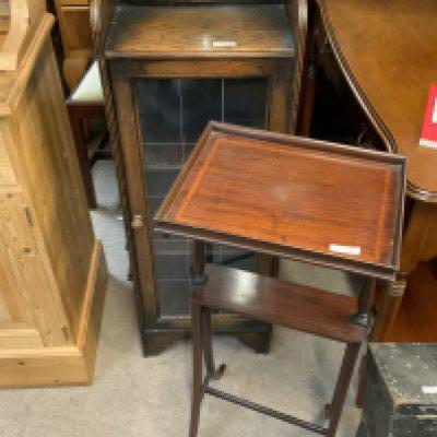 A small Edwardian side table together with a 1930s oak glazed cabinet
