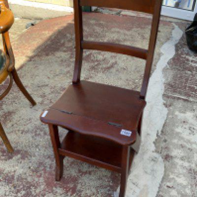 A modern convertible folding chair/library steps.