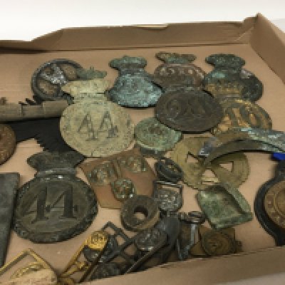 WITHDRAWN - A collection of original 19th Century Military Shako helmet plates and other related oddments.