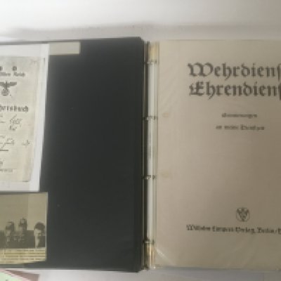 An interesting Album of German II World War Third Reich military photos and documents from 1937 onwards.