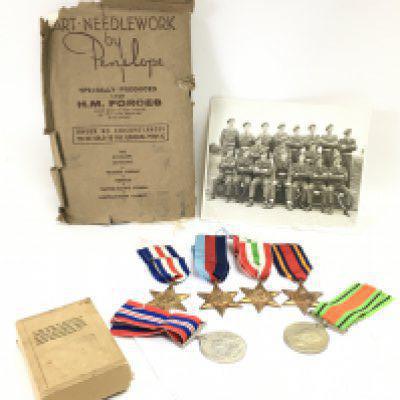 A collection of WW2 medals including Italy, 1939-45, Burma, France And Germany stars. Defence medal, war medal. Also including a photograph and a H.M Forces art needlework kit. Postage category A
