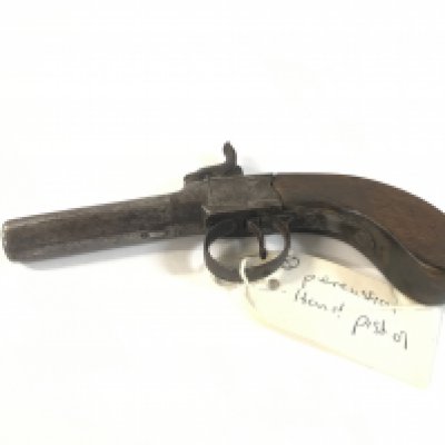 A small percussion pistol.