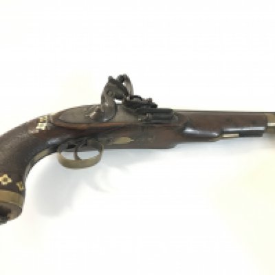 An interesting flintlock pistol inlaid with bone.