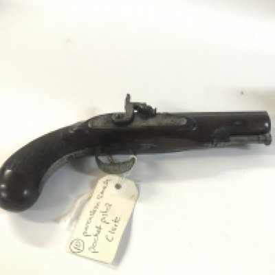 A small percussion pistol inscribed with the makers name "Clark".