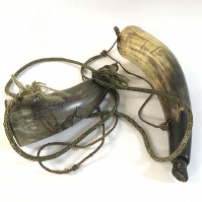 Two horn powder flasks.