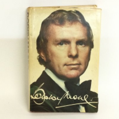 A Bobby Moore signed authorised biography signed Jeff Powell, postage category B