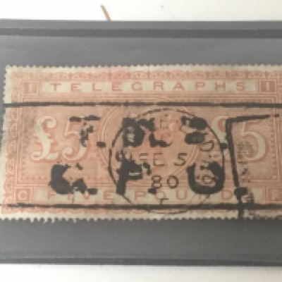 A Rare Victorian Telegraphs Five pound Orange Stamp. Over stamps in black ink.