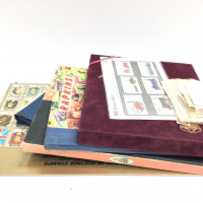 A collection of world Stamps , Esso Squelchers collection, Esso football club badges etc. postage category B. NO RESERVE