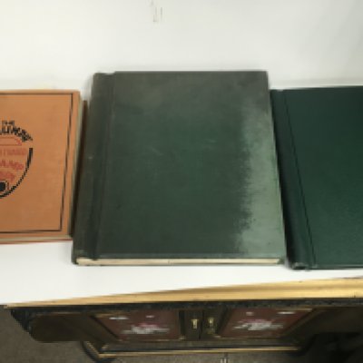 Three albums containing GB and world stamps .