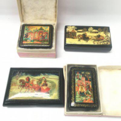 Four Russian papier-m&acirc;ch&eacute; boxes.