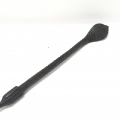 A mother of pearl and green stone set hand carved tribal club.