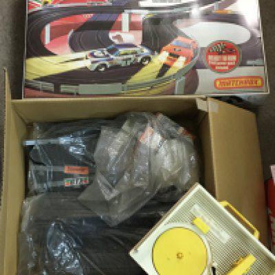 A boxed Matchbox power track 3000 & a Fisher Price Record player