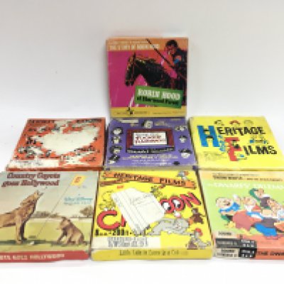 Vintage 8mm films including Walt Disney The Dwarfs Dilemma, Coyote goes Hollywood, Heritage Films Little Lulu in Loose in a Caboose. Postage category B. NO RESERVE