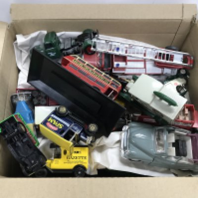 A box containing die cast cars and other die cast vehicles.- NO RESERVE