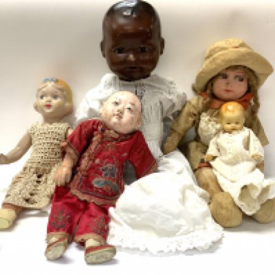 4 vintage dollss to include a Wax example, Fabric, Celluloid, Papier Mache Chinese example, composite.