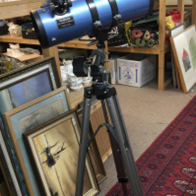 A Modern Sky Watch Telescope with adjustable stand and instruction manual and Philips Planisphere.