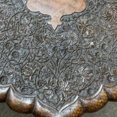 A carved eastern folding table. (D) NO RESERVE