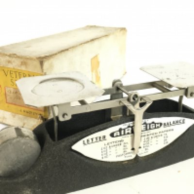A set of vintage boxed Airweigh chrome postal scales