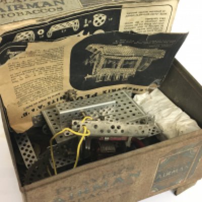 A 1940s Players airman tin cigarette box vintage Meccano parts and manual