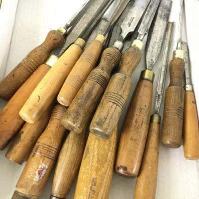 A collection of various woodworking chisels