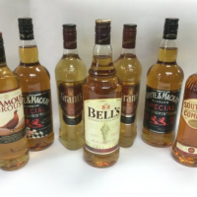 Seven bottles of whisky, various makes including Grants, Whyte & Mackay, Bells and others. Shipping category D