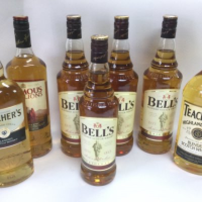 Seven bottles of whisky, various makes comprising Bells, Teachers and Famous Grouse. Shipping category D