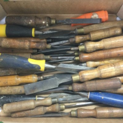 A box of wood chisels. Shipping category D.