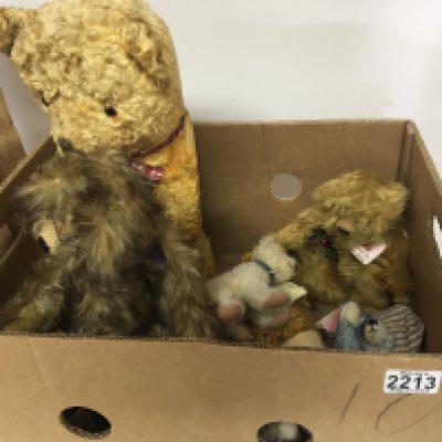 A box containing a collection of Vintage Teddy Bears including a small Eisbar bear with hanging tags and other bears.