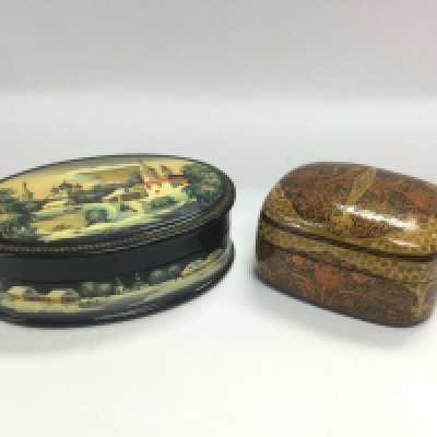 A Russian lacquered box and one other, largest length approx 13cm. Shipping category B.