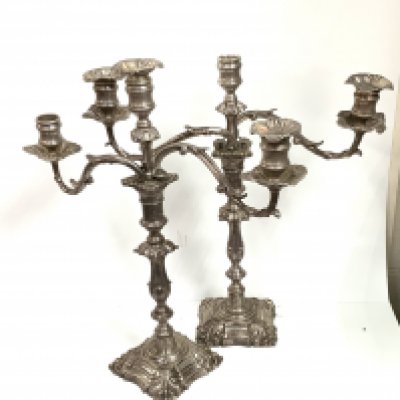 A pair of silver plated tri branch candelabra. H.46.5cm