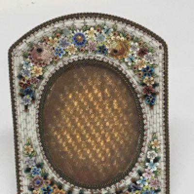An Early 20th century micro mosaic picture frame with raised flowers and foliage. 11x9cm good condition.