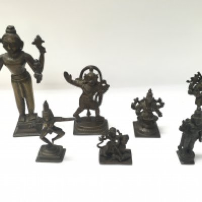 A collection of Indian bronze figures including Hanuman Ganesha etc. Postage B